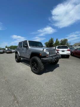 2013 Jeep Wrangler Unlimited for sale at Sound Auto Land LLC in Auburn WA