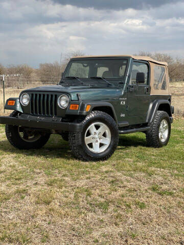 2002 Jeep Wrangler for sale at Andover Auto Group, LLC. in Argyle TX