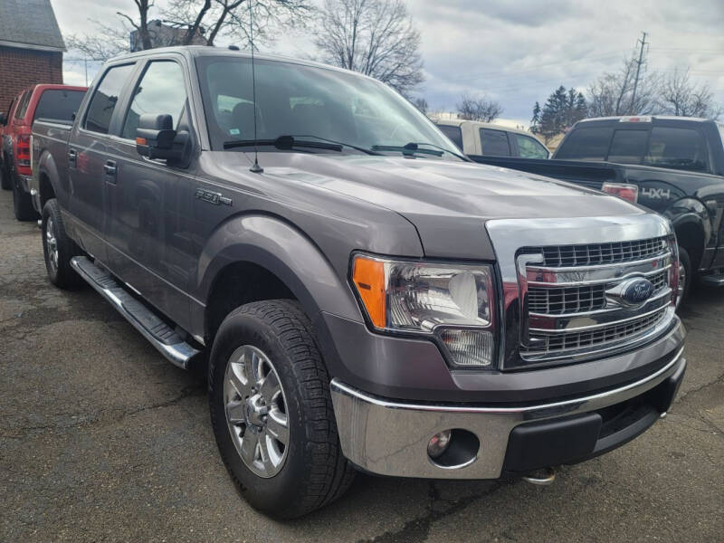 2013 Ford F-150 for sale at J & J Used Cars inc in Wayne MI
