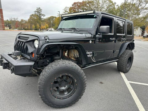 2013 Jeep Wrangler Unlimited for sale at G-Brothers Auto Brokers in Marietta GA
