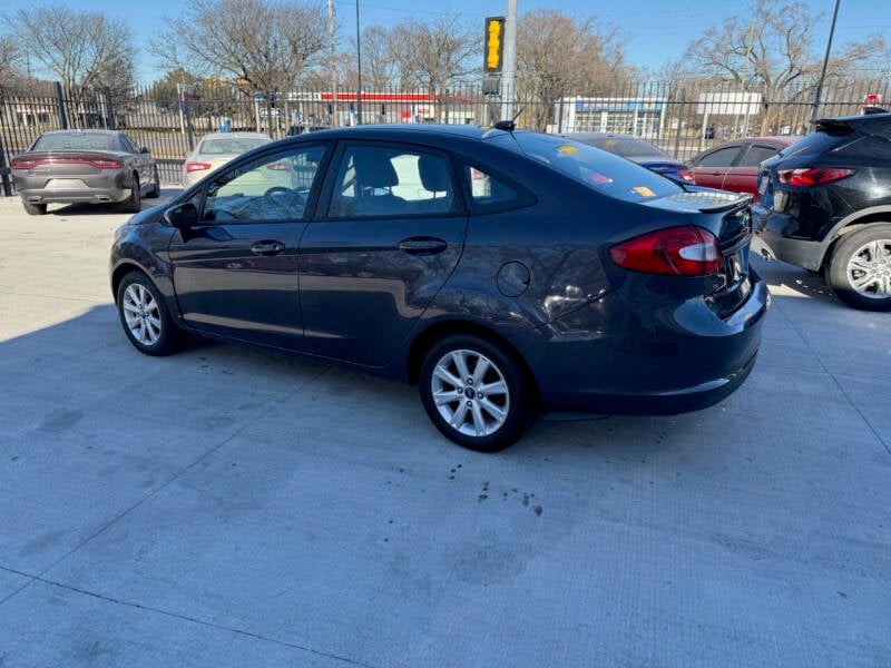 Used 2012 Ford Fiesta SE with VIN 3FADP4BJ9CM114855 for sale in Detroit, MI