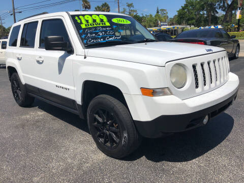 2013 Jeep Patriot for sale at RIVERSIDE MOTORCARS INC - South Lot in New Smyrna Beach FL