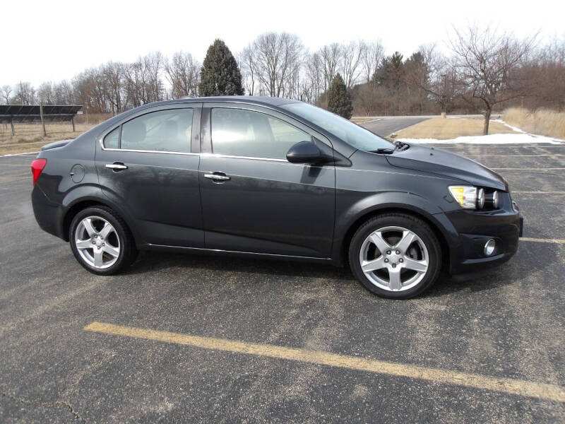 2015 Chevrolet Sonic for sale at Crossroads Used Cars Inc. in Tremont IL