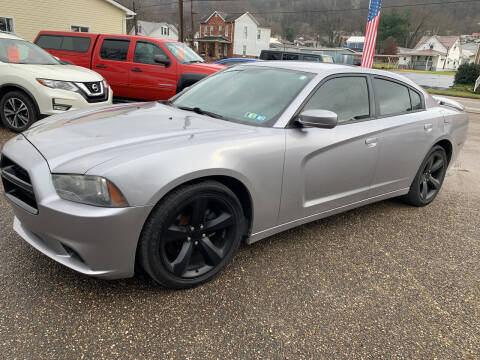 2013 Dodge Charger for sale at MYERS PRE OWNED AUTOS & POWERSPORTS in Paden City WV