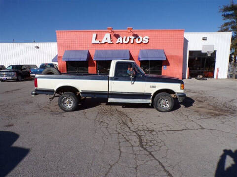 1990 Ford F-150 for sale at L A AUTOS in Omaha NE