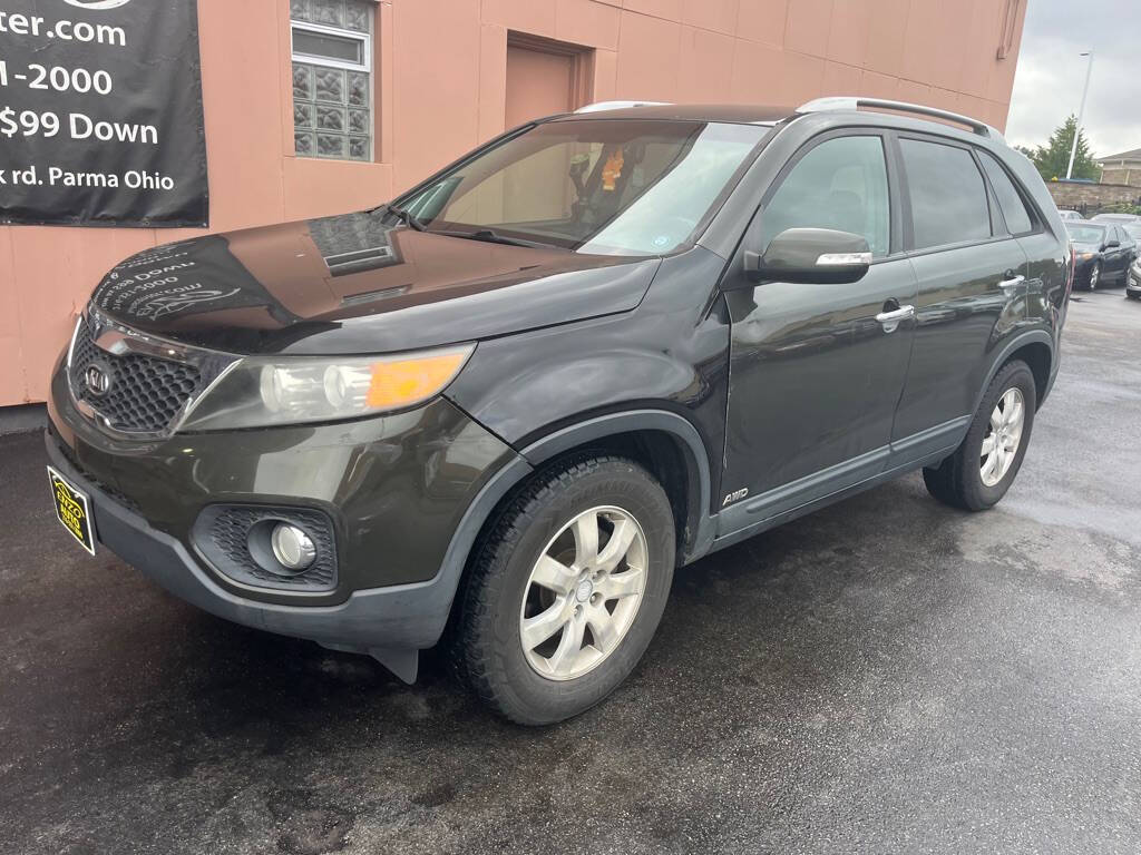 2011 Kia Sorento for sale at ENZO AUTO in Parma, OH