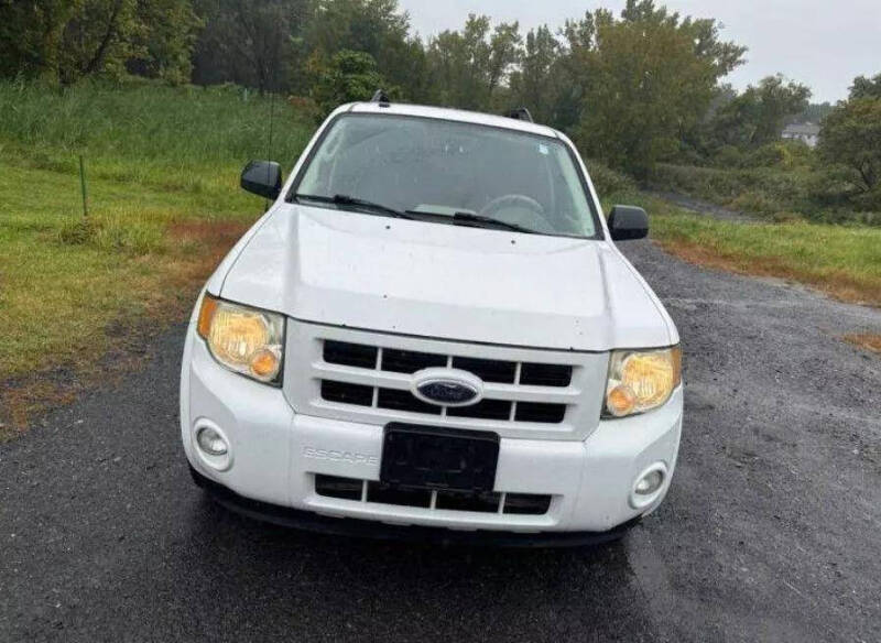 2009 Ford Escape Hybrid for sale at T & Q Auto in Cohoes NY