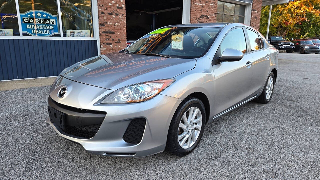 2012 Mazda Mazda3 for sale at North Ridge Auto Center LLC in Madison, OH