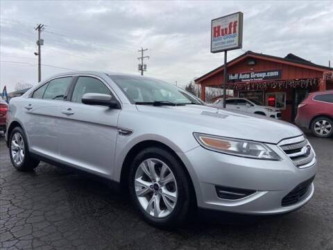 2011 Ford Taurus for sale at HUFF AUTO GROUP in Jackson MI