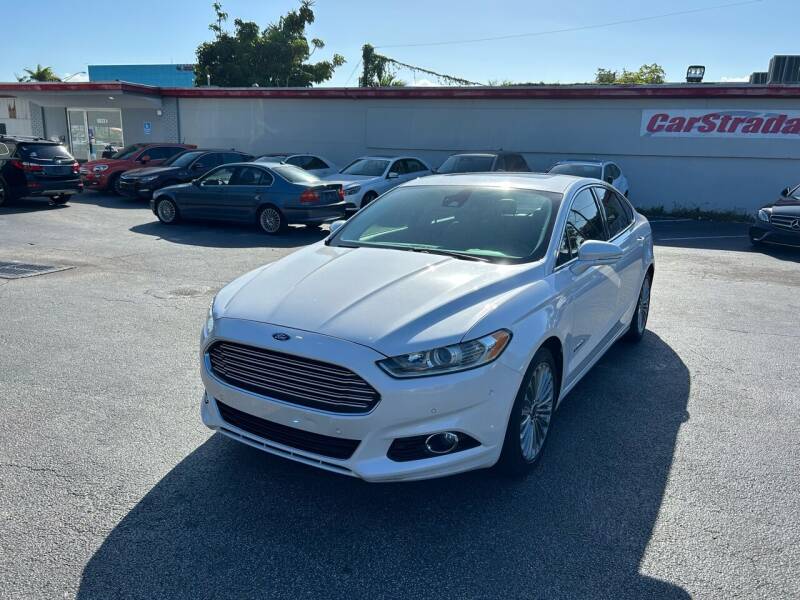 2014 Ford Fusion Hybrid for sale at CARSTRADA in Hollywood FL