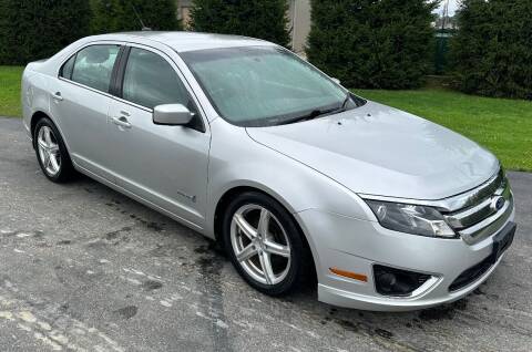 2011 Ford Fusion Hybrid for sale at Heely's Autos in Lexington MI