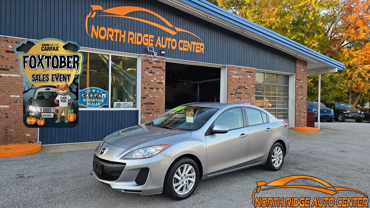 2012 Mazda Mazda3 for sale at North Ridge Auto Center LLC in Madison, OH