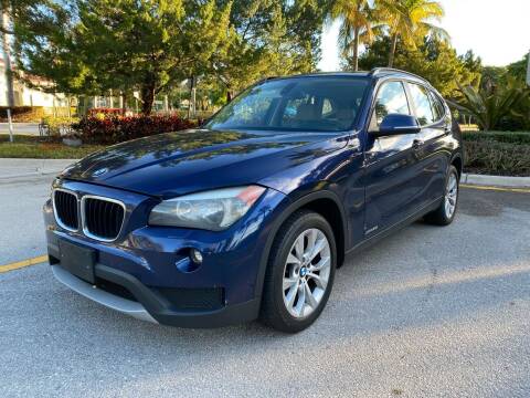 2014 BMW X1 for sale at Plus Auto Sales in West Park FL
