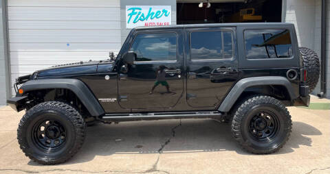 2014 Jeep Wrangler Unlimited for sale at Fisher Auto Sales in Longview TX