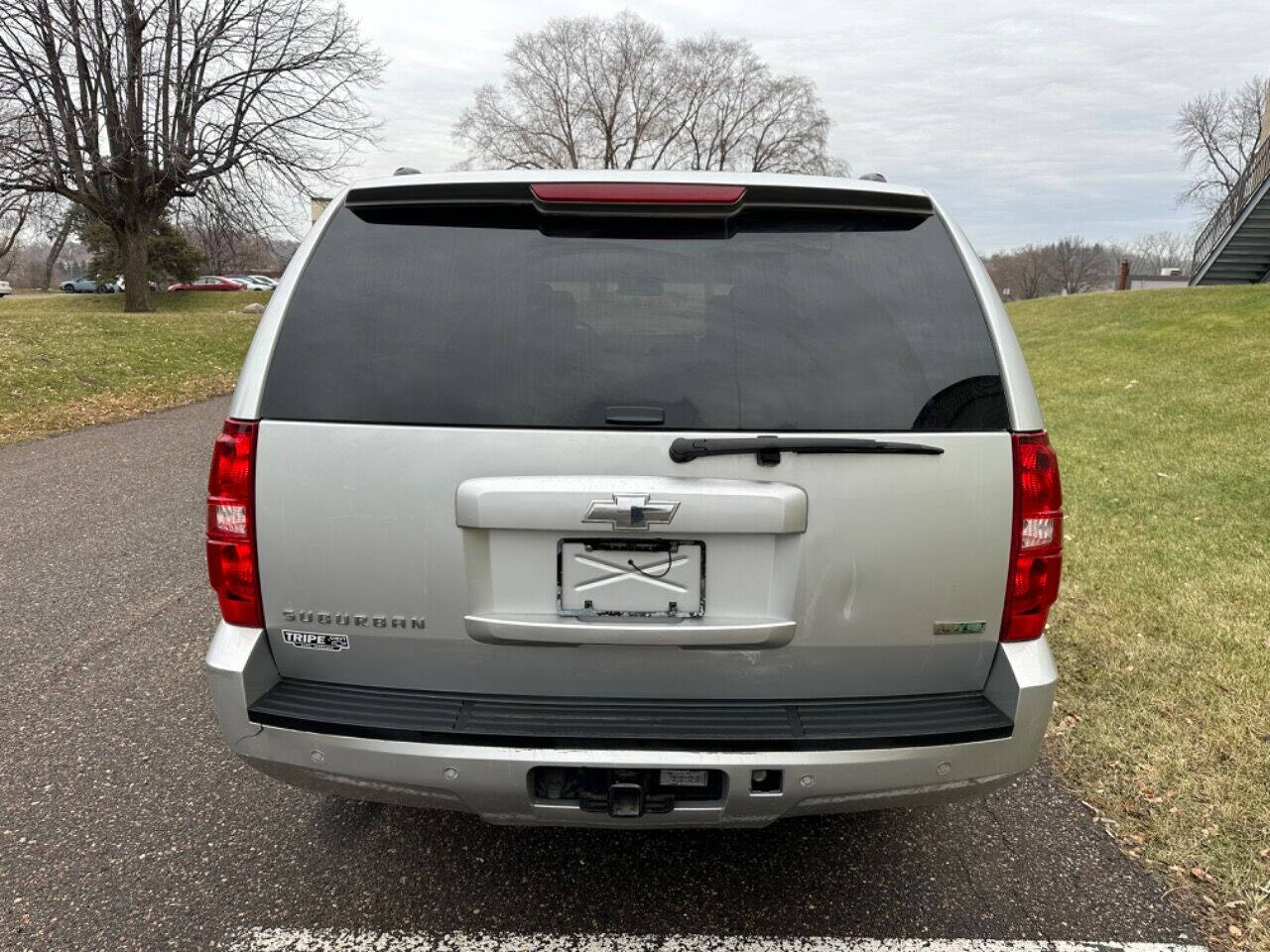 2011 Chevrolet Suburban for sale at JUST AUTOS in MINNEAPOLIS, MN