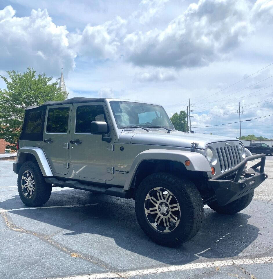 2013 Jeep Wrangler Unlimited for sale at International Car Service, Inc in DULUTH, GA