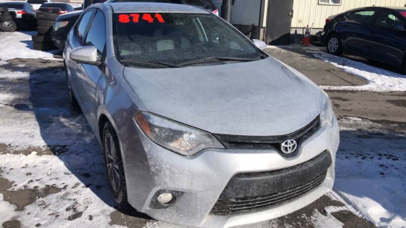 2014 Toyota Corolla for sale at BELOW BOOK AUTO SALES in Idaho Falls ID