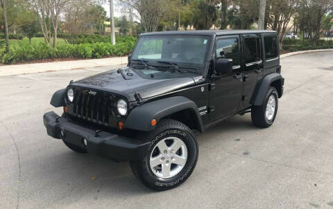 2013 Jeep Wrangler Unlimited for sale at FIRST FLORIDA MOTOR SPORTS in Pompano Beach FL