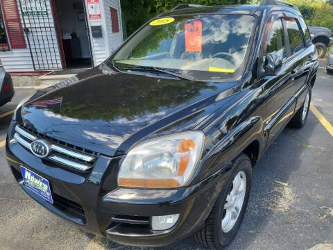 2005 Kia Sportage for sale at Howe's Auto Sales in Lowell MA