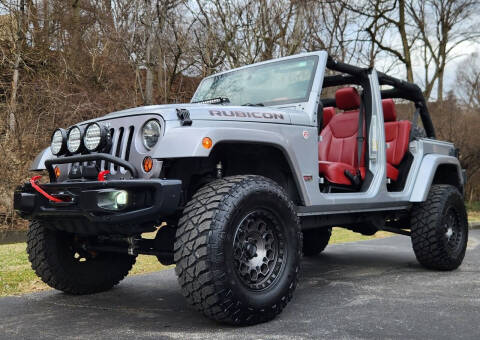 2013 Jeep Wrangler Unlimited for sale at The Motor Collection in Columbus OH