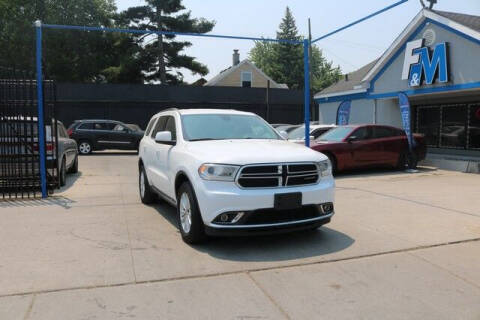 2015 Dodge Durango for sale at F & M AUTO SALES in Detroit MI