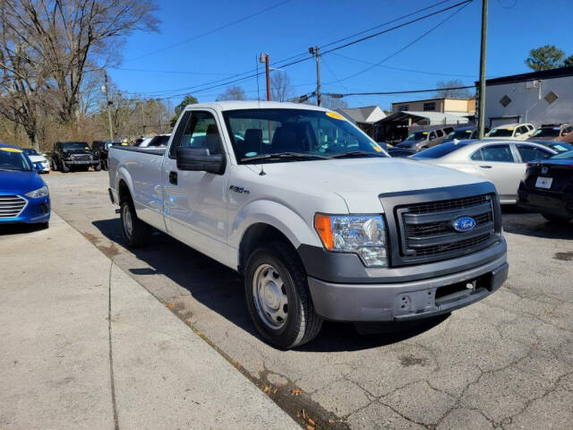 2013 Ford F-150 for sale at DAGO'S AUTO SALES LLC in Dalton, GA