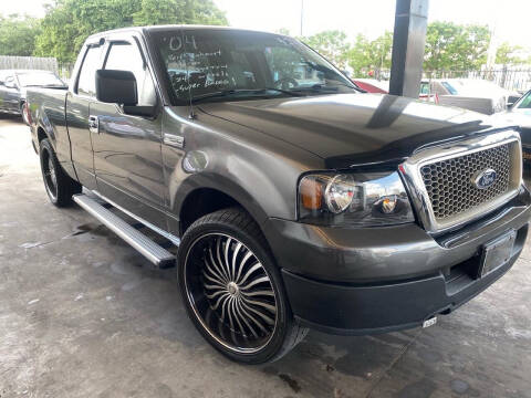 2004 Ford F-150 for sale at Buy-Fast Autos in Houston TX