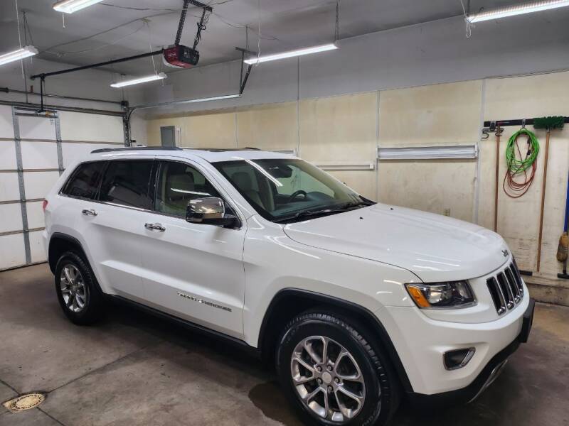 2014 Jeep Grand Cherokee for sale at MADDEN MOTORS INC in Peru IN