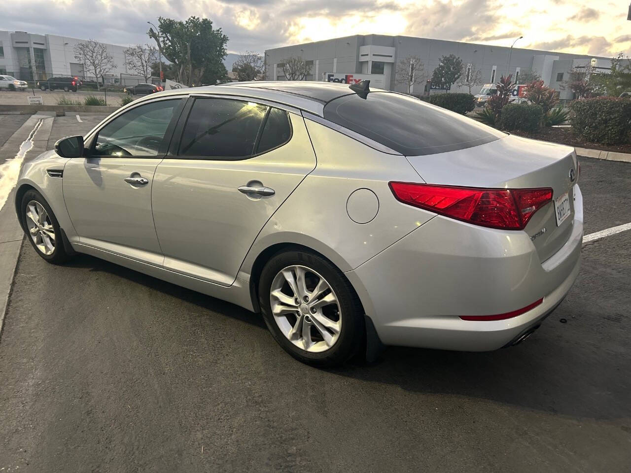 2013 Kia Optima for sale at STM AUTO GROUP LLC in Corona, CA