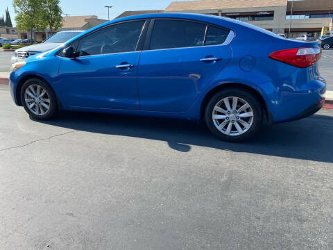 2014 Kia Forte for sale at Brown Auto Sales Inc in Upland CA