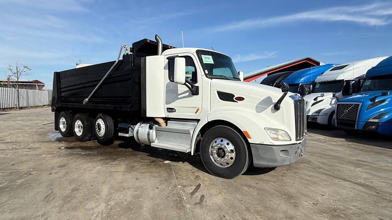 2018 PETERBILT 579 SUPER 10 DUMP TRUCK 18' NEW BODY for sale at KING TRUCK TRAILER SALES in Bakersfield, CA