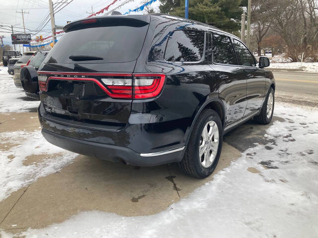 2015 Dodge Durango for sale at Chuckie Bizzarro's Fleetwing Auto in Erie, PA