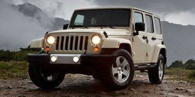 2012 Jeep Wrangler Unlimited for sale at Budget Car Sales in Douglas GA