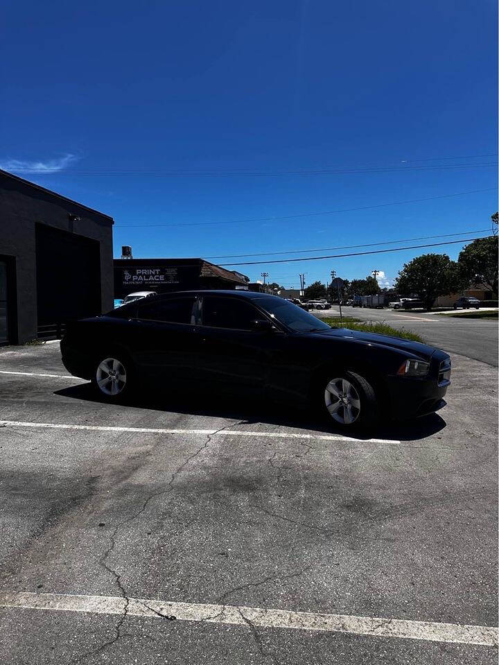 2012 Dodge Charger for sale at ALPHA AUTOMOTIVE SALES in Oakland Park, FL