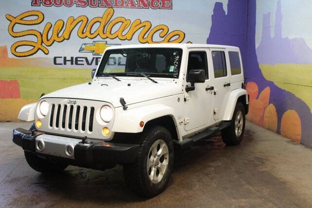 Used 2015 Jeep Wrangler Unlimited Sahara with VIN 1C4BJWEG5FL674246 for sale in Grand Ledge, MI