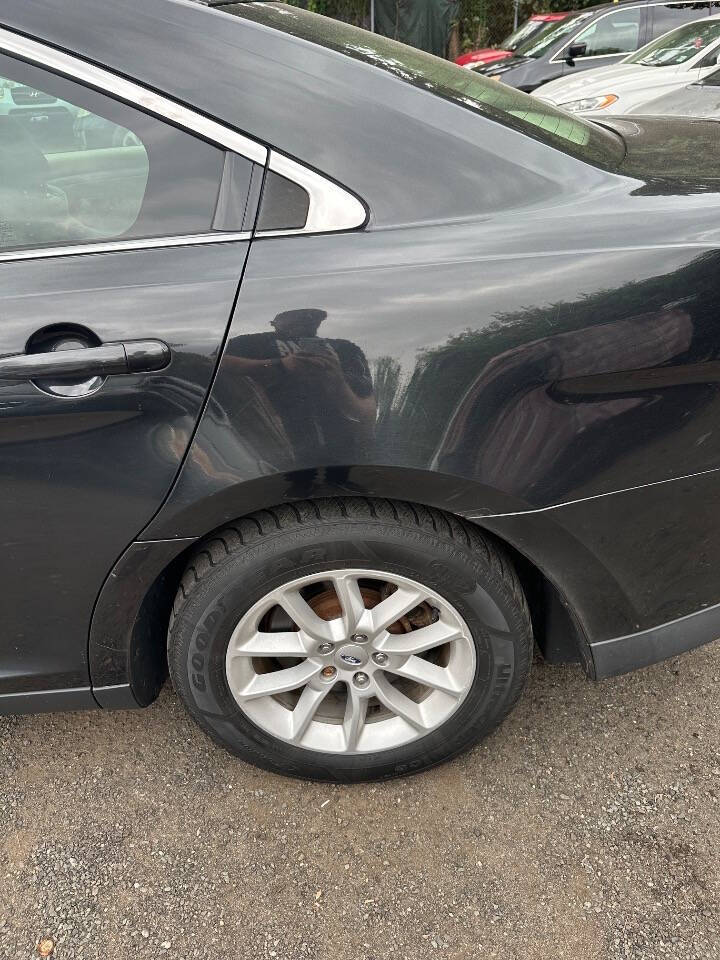 2013 Ford Taurus for sale at 77 Auto Mall in Newark, NJ