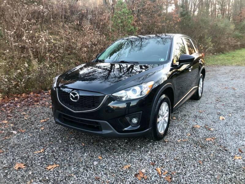2014 Mazda CX-5 for sale at R.A. Auto Sales in East Liverpool OH
