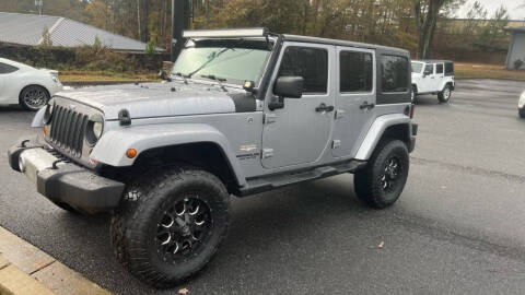 2013 Jeep Wrangler Unlimited for sale at AMG Automotive Group in Cumming GA