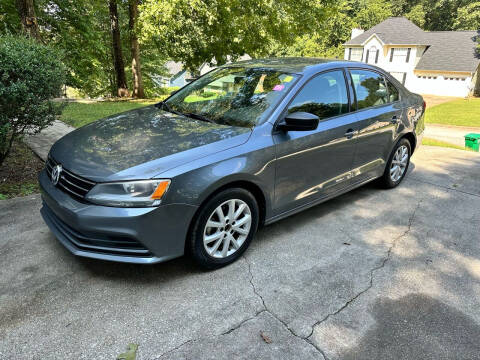 2015 Volkswagen Jetta for sale at Palmer Automobile Sales in Decatur GA