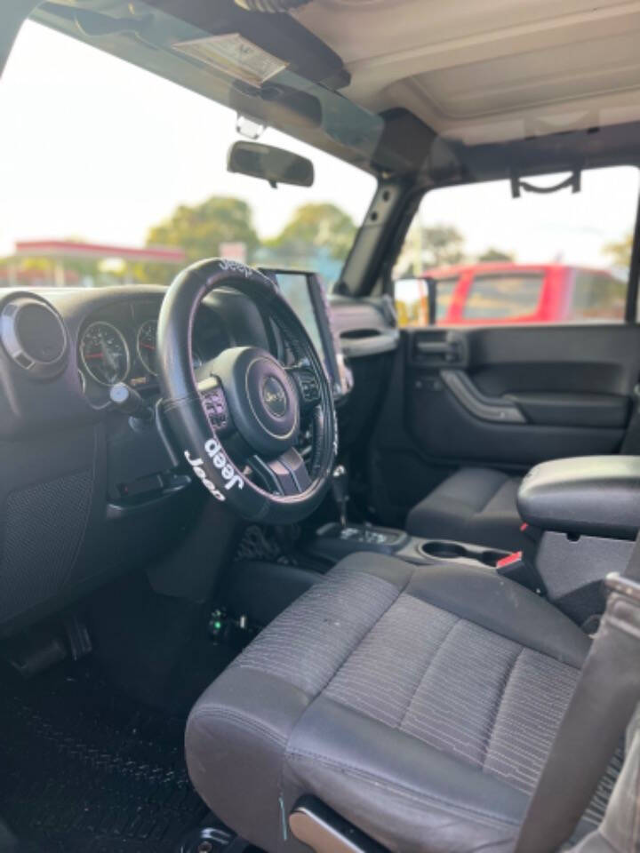 2012 Jeep Wrangler Unlimited for sale at J-R Auto Sales LLC in Houston, TX