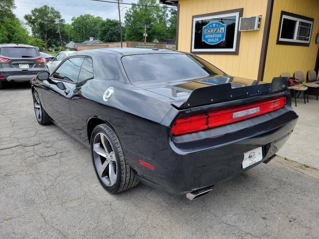 2014 Dodge Challenger for sale at DAGO'S AUTO SALES LLC in Dalton, GA