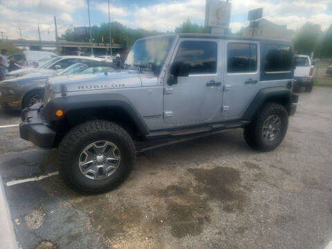 2016 Jeep Wrangler Unlimited for sale at A-1 AUTO AND TRUCK CENTER in Memphis TN