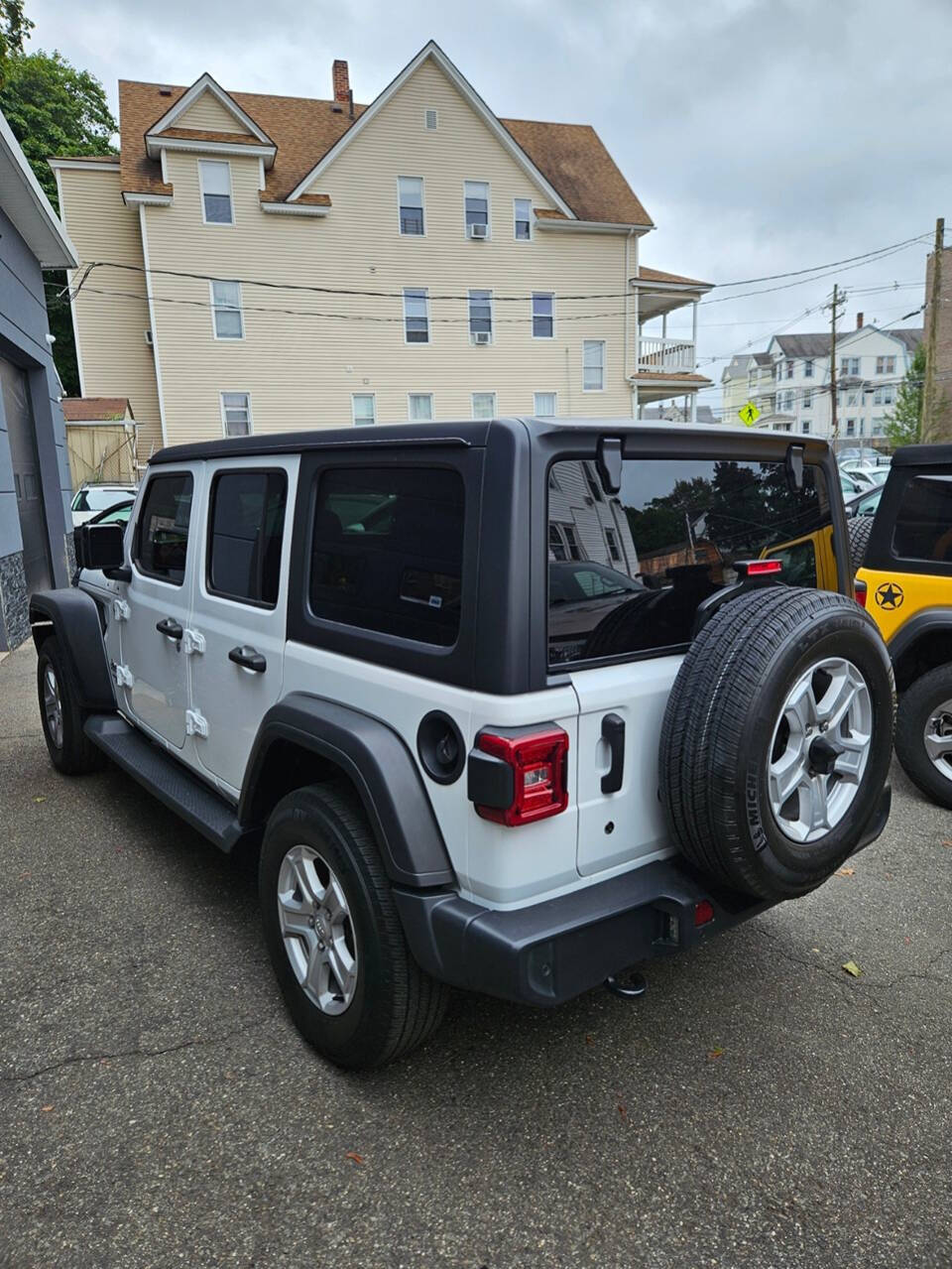 2019 Jeep Wrangler Unlimited for sale at RENOS AUTO SALES LLC in Waterbury, CT