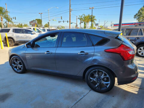 2014 Ford Focus for sale at E and M Auto Sales in Bloomington CA