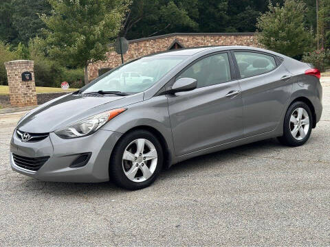 2013 Hyundai Elantra for sale at Two Brothers Auto Sales in Loganville GA