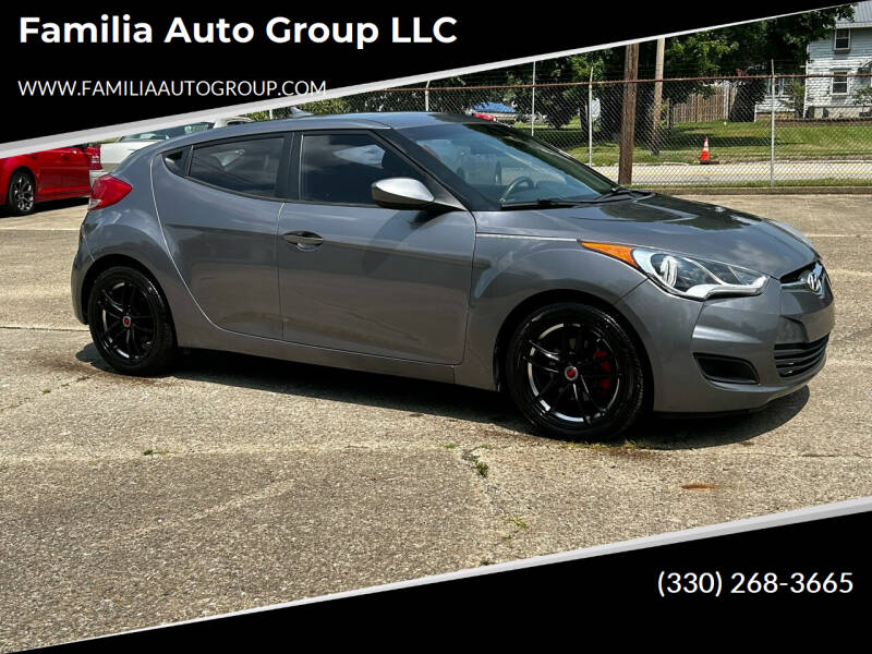 2015 Hyundai Veloster for sale at Familia Auto Group LLC in Massillon OH