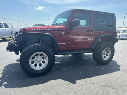 2010 Jeep Wrangler for sale at AJOULY AUTO SALES in Moore OK