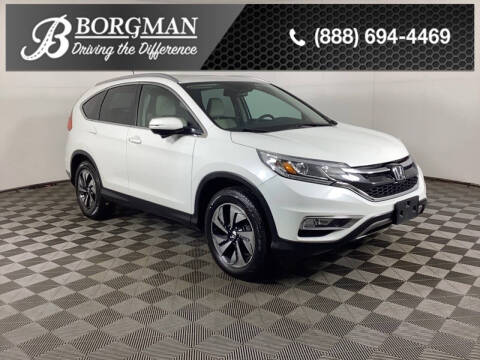 2015 Honda CR-V for sale at BORGMAN OF HOLLAND LLC in Holland MI