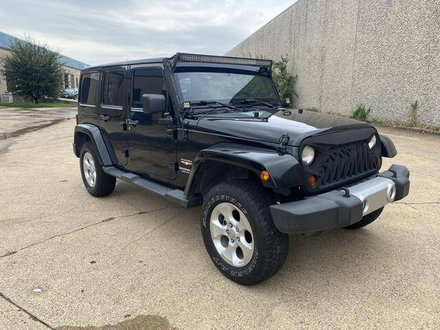 2013 Jeep Wrangler Unlimited for sale at Auto Place Inc. in Dallas TX