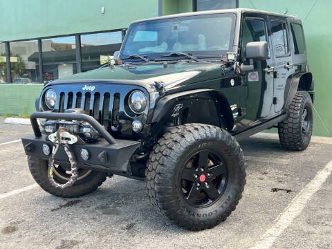 2014 Jeep Wrangler Unlimited for sale at KARZILLA MOTORS in Oakland Park FL